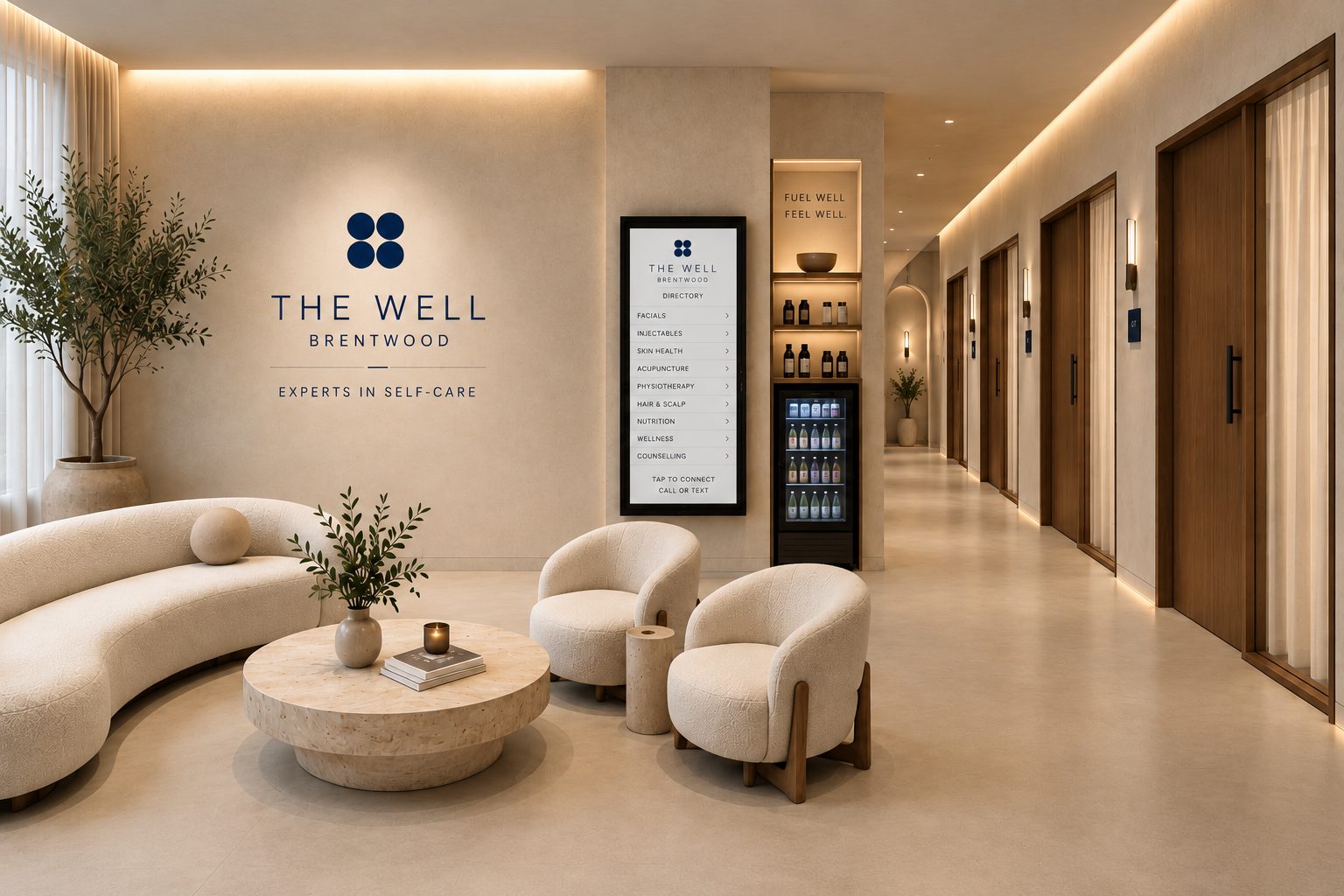 The lobby at The Well — a shared reception with a directory of every professional